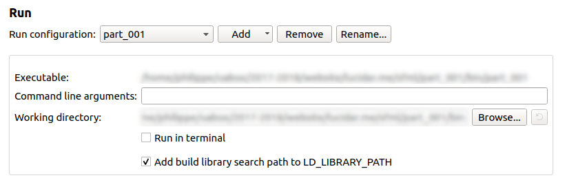 Uncheck 'Run in terminal' in Qt Creator